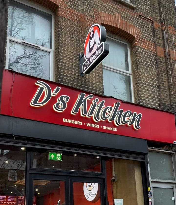 The red D’s Kitchen sign above the Holloway Rd shop